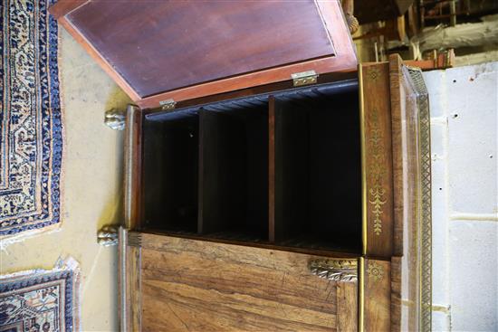 A Regency brass inset rosewood breakfront dwarf bookcase, with pierced brass three quarter gallery, two panelled and two pleated doors,